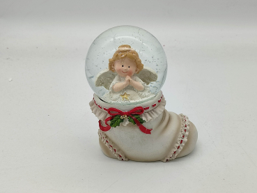 Snow globe angel praying in boot